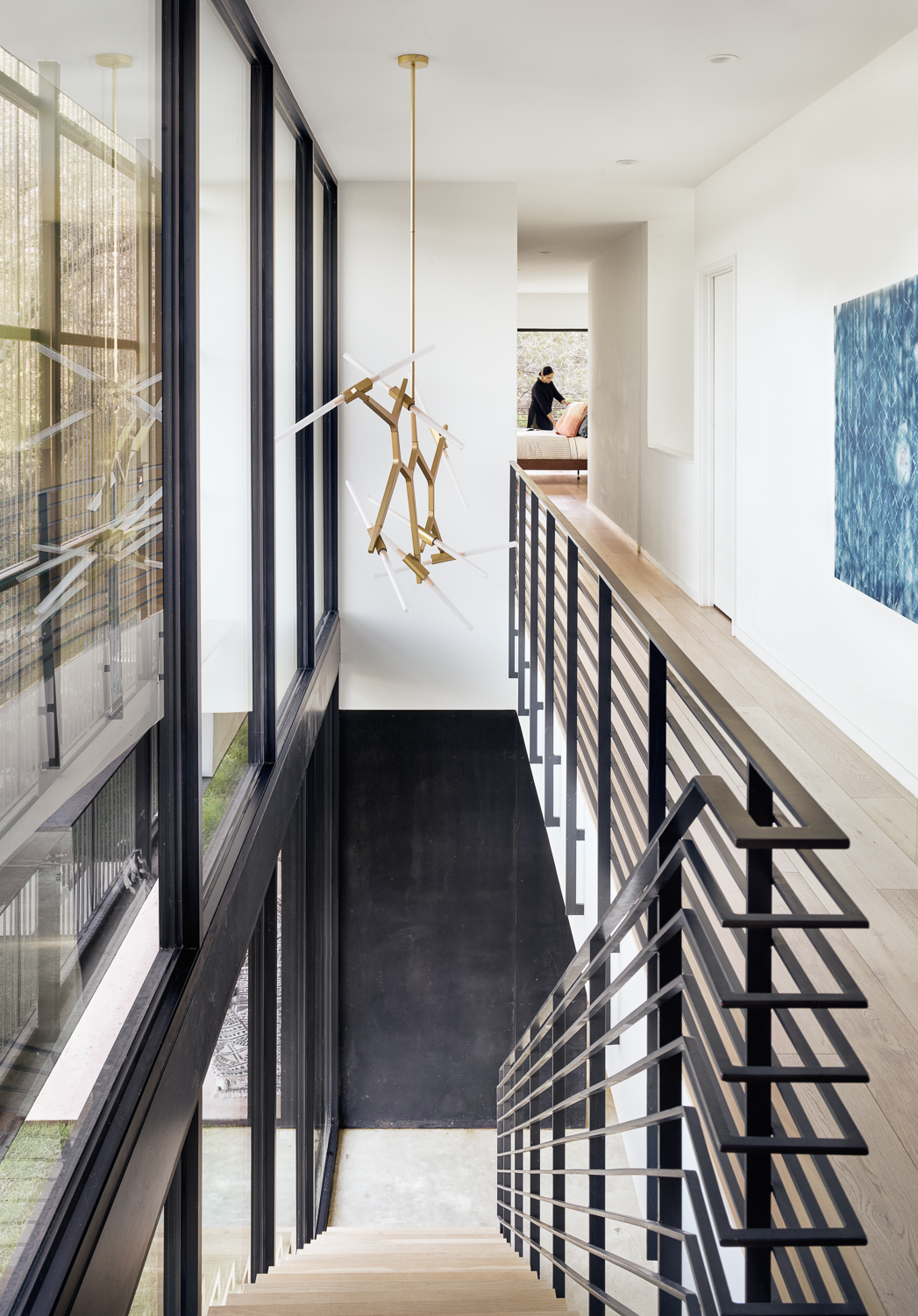 Stairwell and hallway of modern home in Austin
