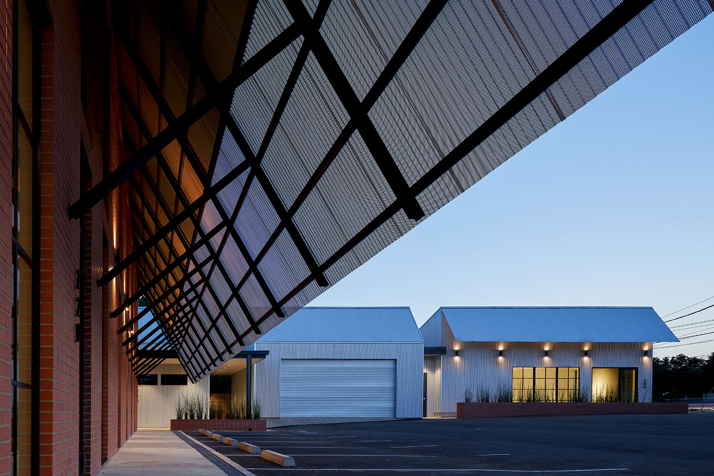 Exterior awning and walkway of Texas Construction Company office new construction by Chioco design architecture