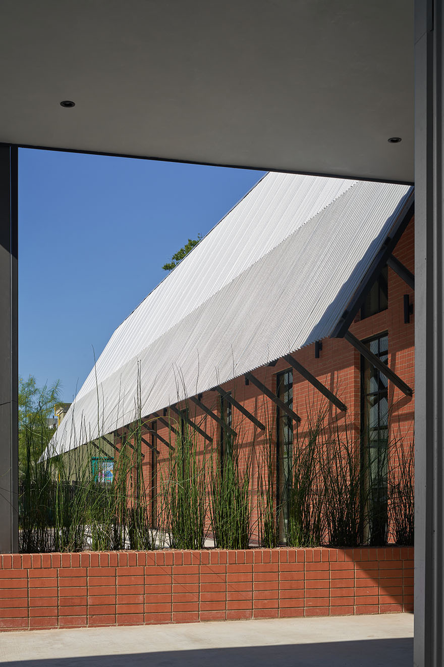 Looking out window of Texas Construction Company office new construction by Chioco design architecture