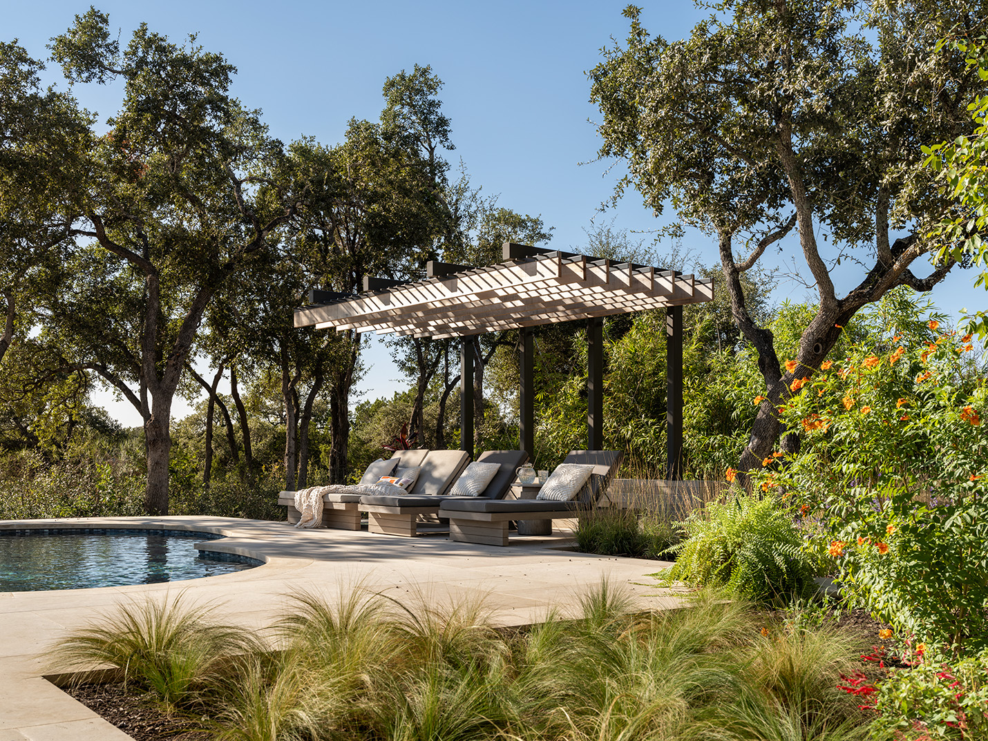 House Renovation & Addition in Austin, TX - Pool area with custom pergola.