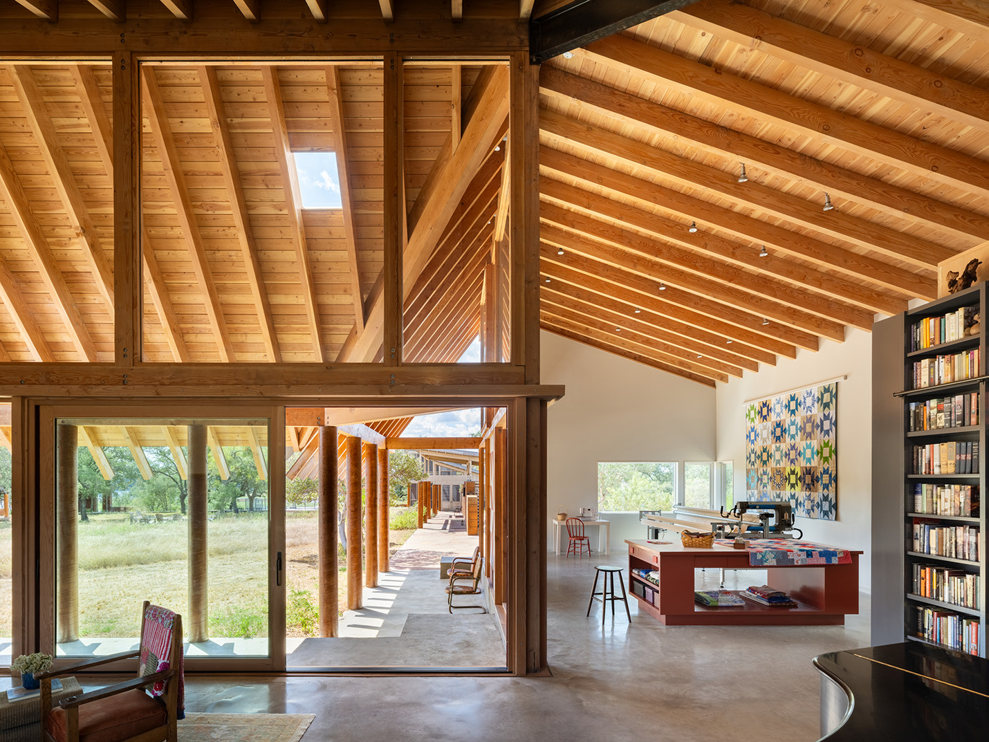Interior of custom home in Austin, TX with exposed wood ceiling, natural light, and open-concept living space built by Texas Construction Company